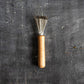 This set of renewable resource brushes removes static and conditions hair naturally. The comb targets flyaways and splits while hydrating the scalp.
