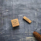 Top View: Plantish Future Home & Kitchen White Stain Remover block (3.5oz) and Stick (0.5oz) in its brown cardboard box with the words "Plantish Stain Remover Block Baton Detachant"