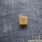 Top View: Plantish Future Home & Kitchen Stain Remover block (3.5oz) in its brown cardboard box with the words "Plantish Stain Remover Block Baton Detachant"