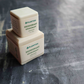 Plantish Future Beauty and Bathroom Zero Waste 2 Deodorant Bars - Front View: Mini (1ounce) white Unscented deodorant bar on top of full (3.5ounce) white unscented deodorant bar)