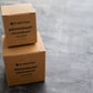 Plantish Future Beauty and Bathroom Zero Waste Deodorant Bar - Front View: 1 one ounce unscented deodorant bar on top of 1 3.5 ounce unscented in kraft paper boxes